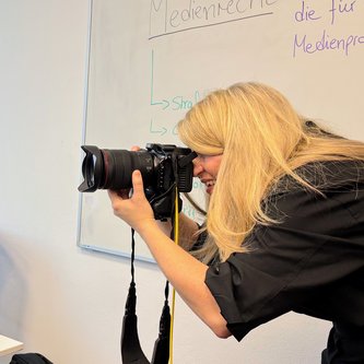 Fotografin bei der Arbeit